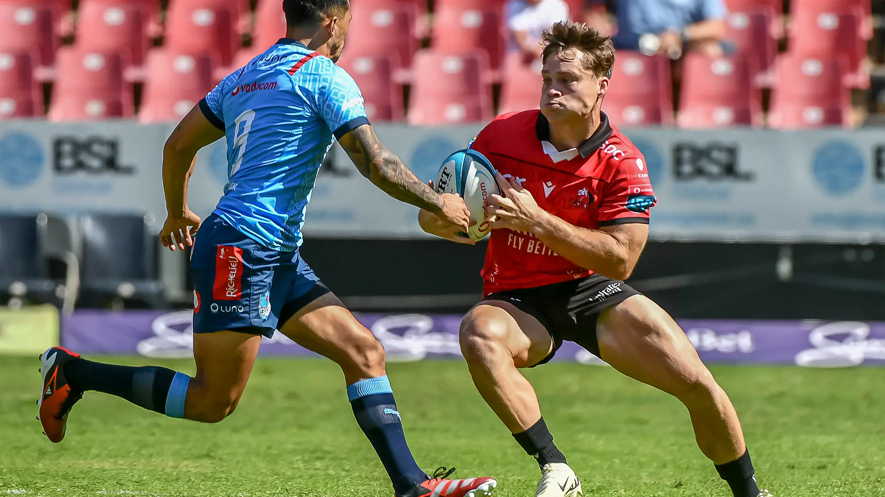 Quan Horn of Lions running with the ball against the Bulls