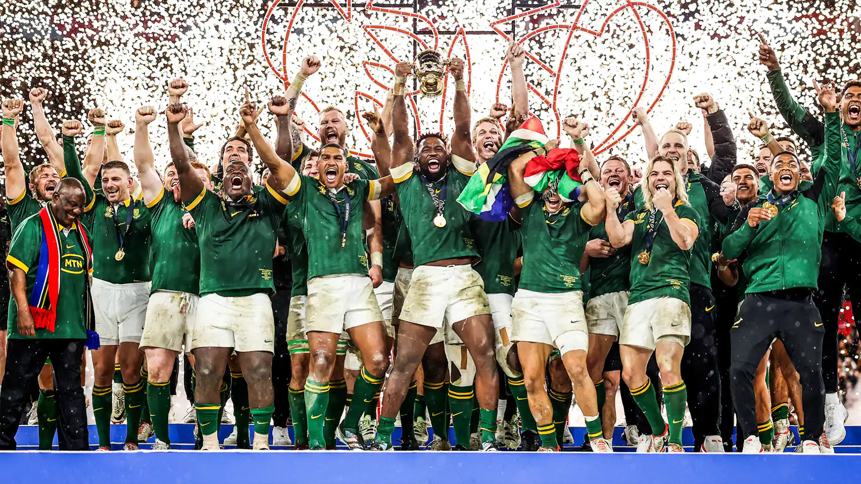 Springboks celebrate with the Webb Ellis trophy