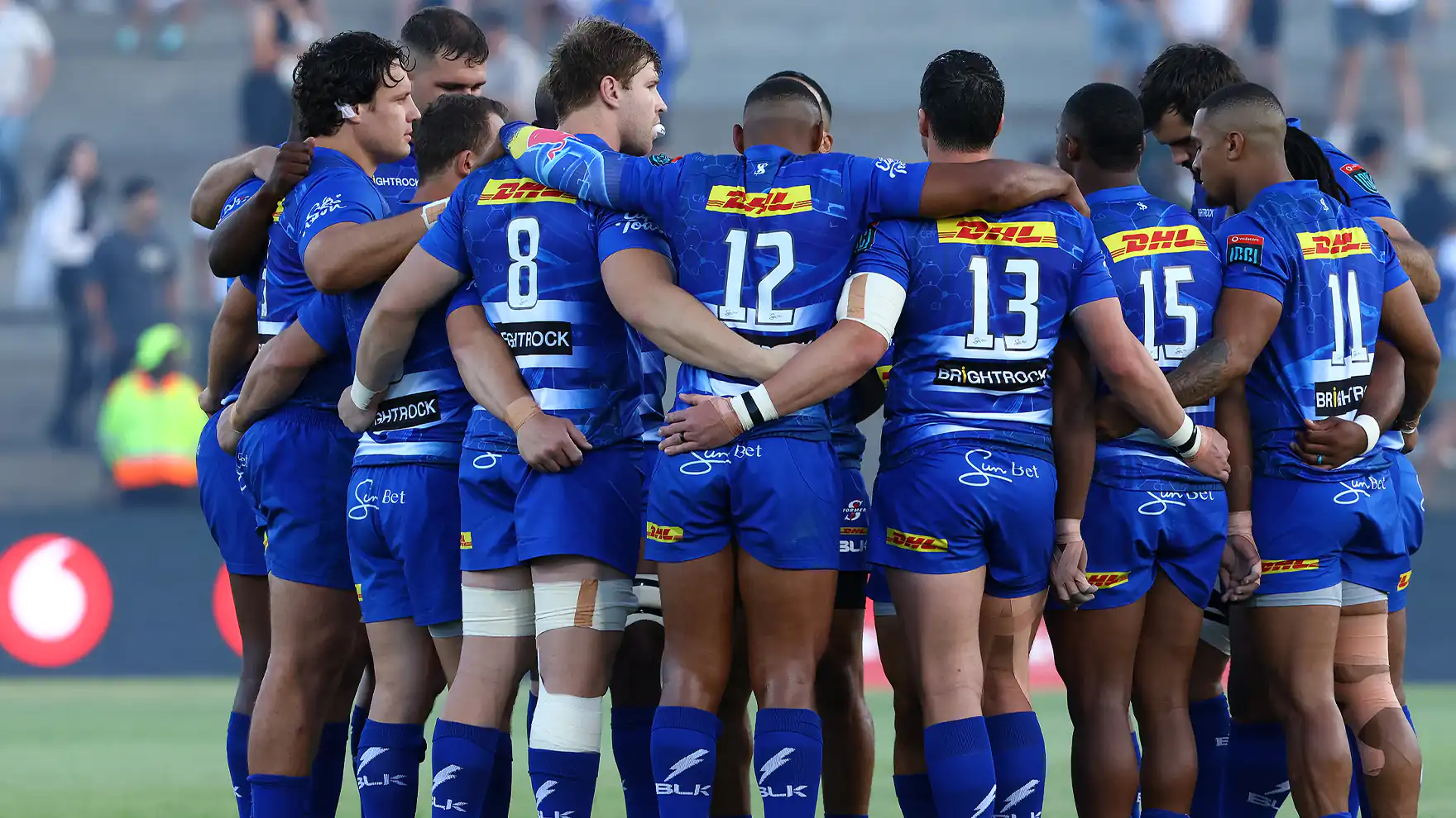 Stormers players huddle on the field