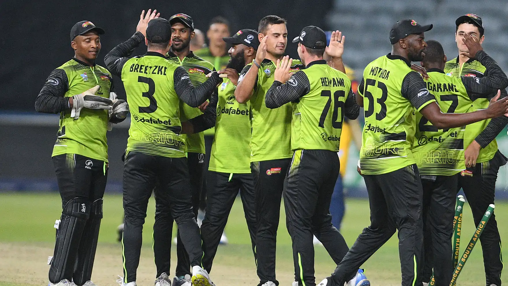 Warriors cricket team celebrating a match win