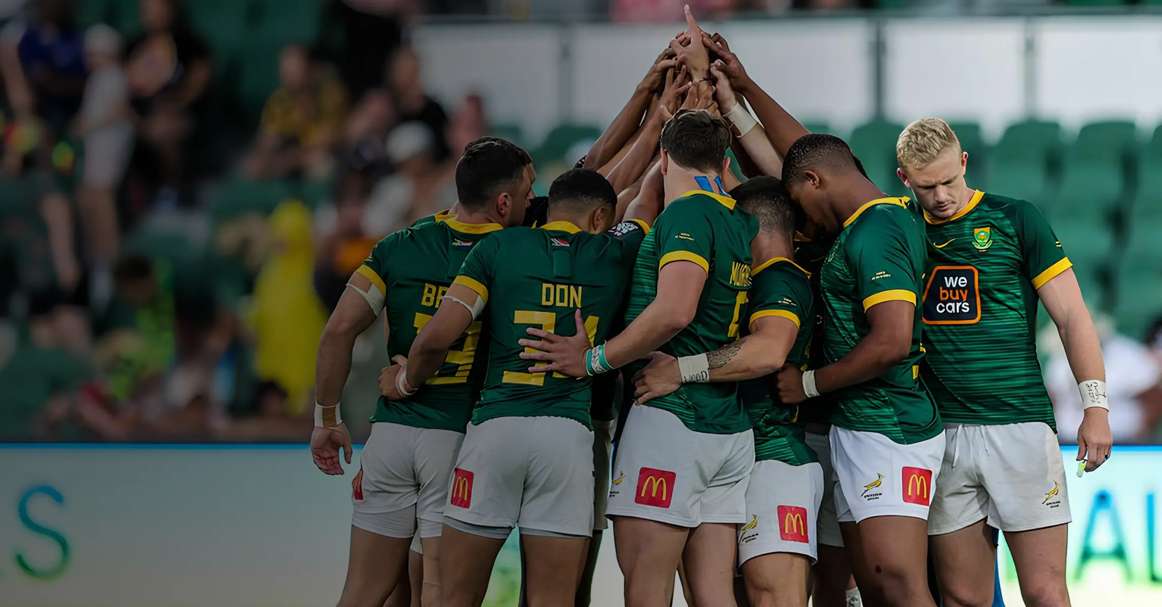 Blitzboks Sevens Rugby Team victoriously lifting the HSBC World Rugby Sevens Series Trophy