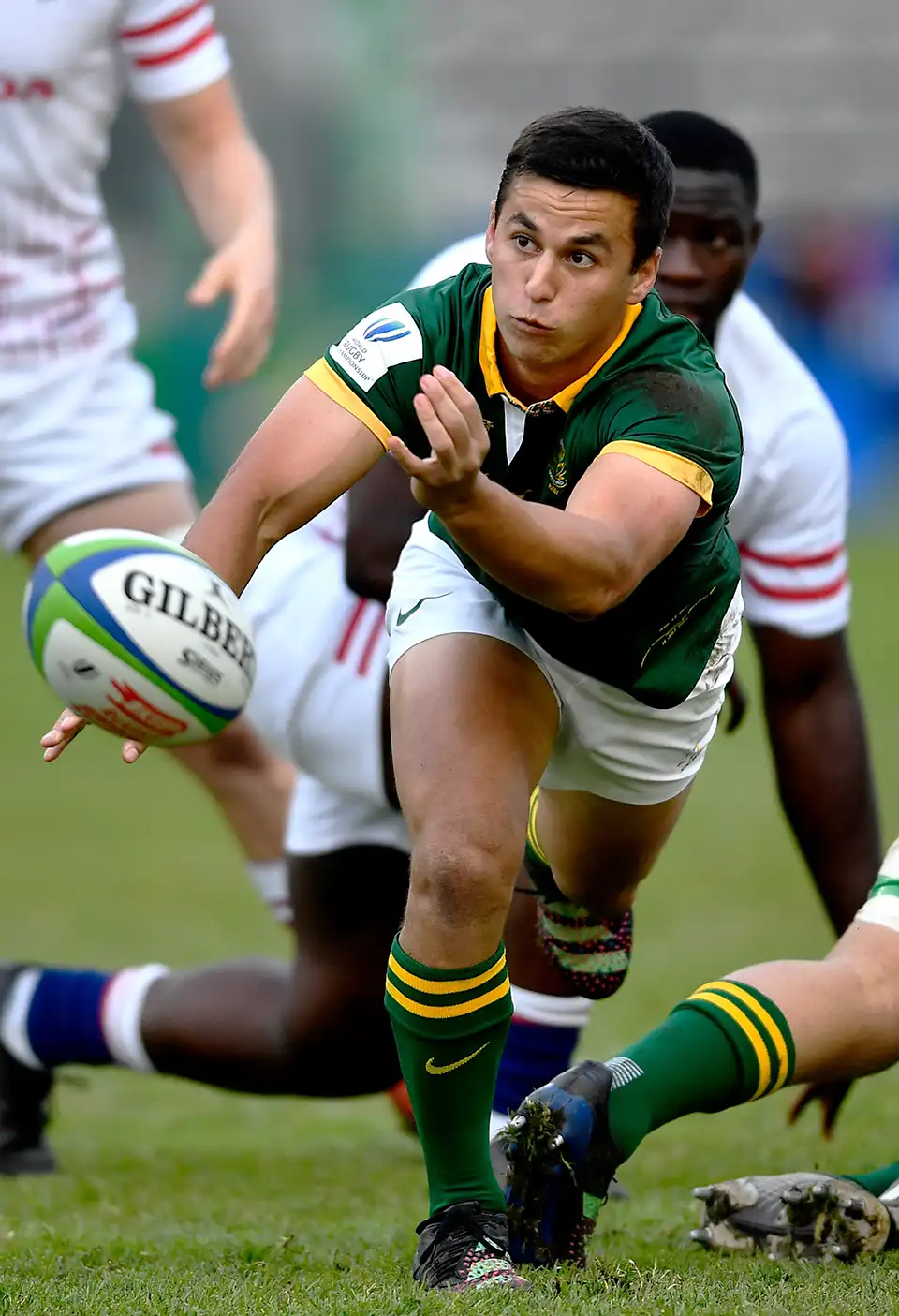 Junior Springbok Player passing the ball