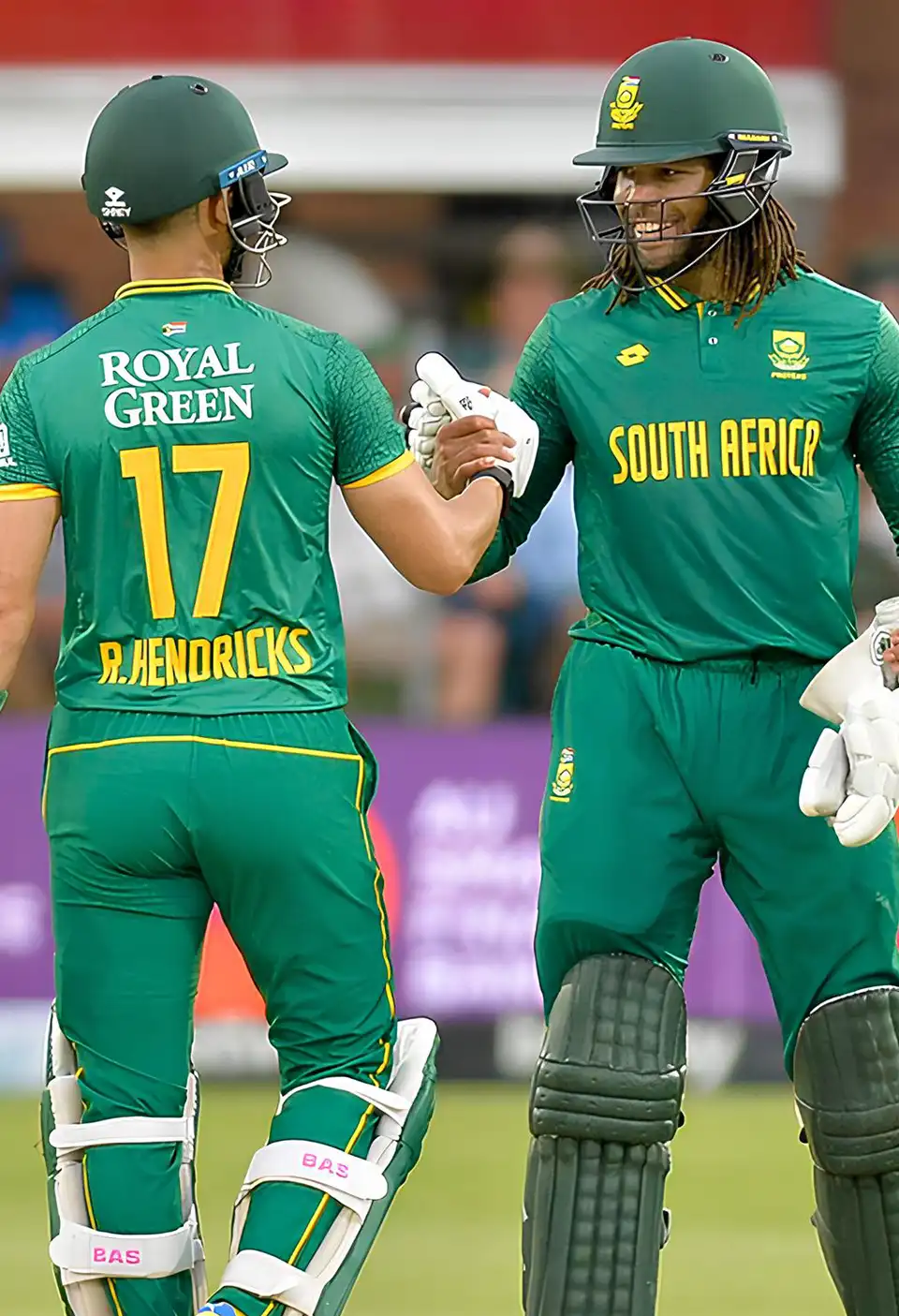 Tony De Zorzi and Reeza Hendricks of the Proteas fist pumping after a boundary