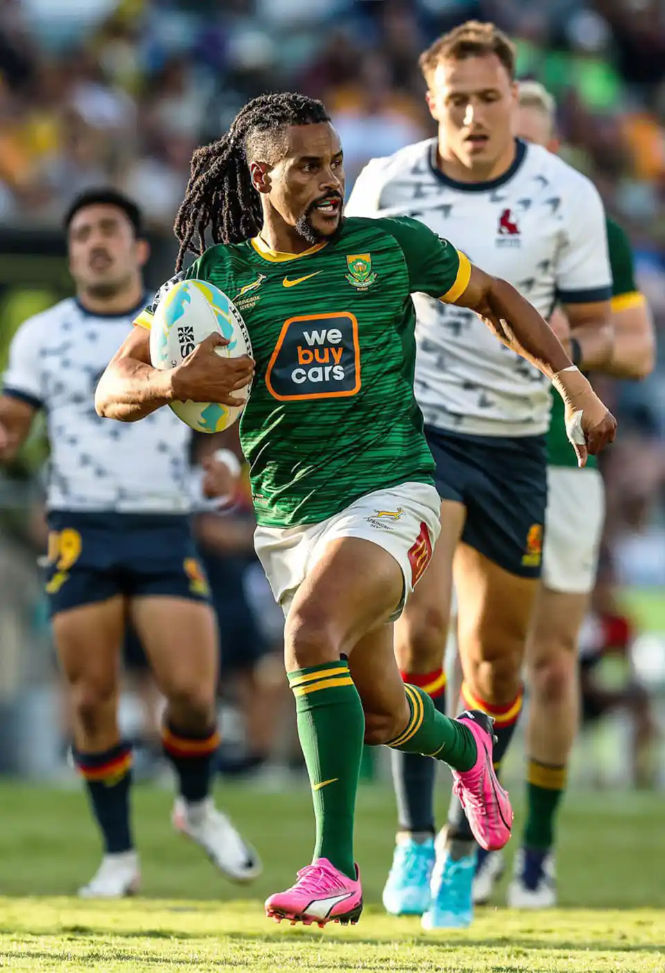 Selwyn Davids running with the ball for We Buy Cars Springbok Sevens