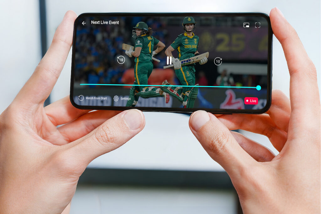 Person watching a live rugby match on a smartphone, illustrating media rights packaging & sales